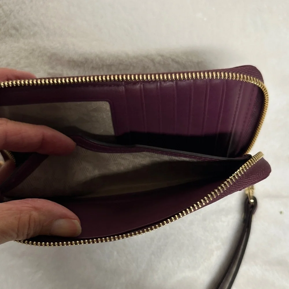 Michael Kors Plum Quilted Wristlet/ wallet